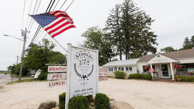 current day kerbers farm photo with american flag